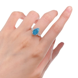 Pear-cut aquamarine blue gemstone ring with diamond halo in S925 silver setting