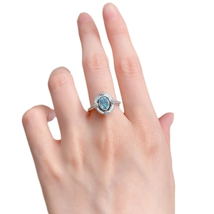Elegant S925 sterling silver ring with 6x8mm oval blue gemstone and diamond accents