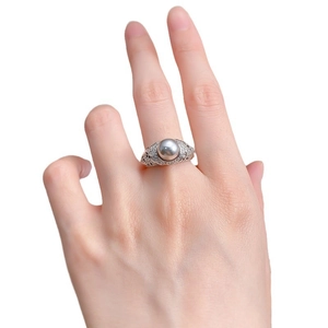 Vintage 8mm silver pearl ring with halo diamond setting and intricate hollow carving