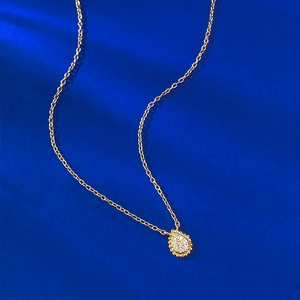 Bohemian gold plated S925 silver pear shaped droplet pendant necklace on blue background