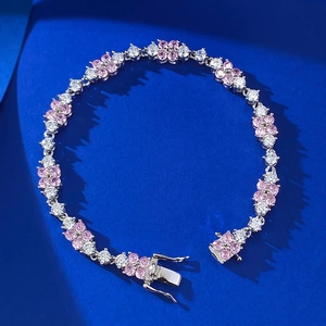 Elegante bracciale in argento 925 con quadrifogli rosa e pietre bianche su seta blu