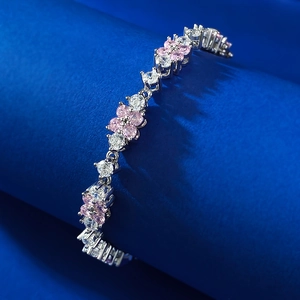 Elegante bracciale in argento 925 con motivi floreali di pietre rosa e bianche