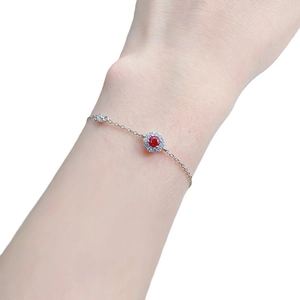 Elegant S925 silver bracelet featuring a pigeon blood red ruby on a female wrist
