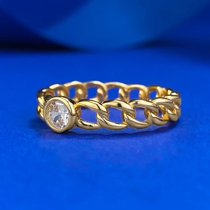 Elegant 925 silver gold Cuban link ring featuring a central round bezel-set sparkling stone