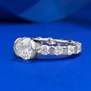 Minimalist S925 sterling silver ring with 7mm round diamond cut stone and side accents
