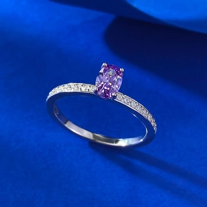 Elegant S925 silver ring featuring an oval purple gemstone with diamond accents on dark silk