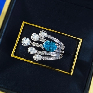 Bague en argent S925 avec pierre bleue ovale et accents en forme de larme