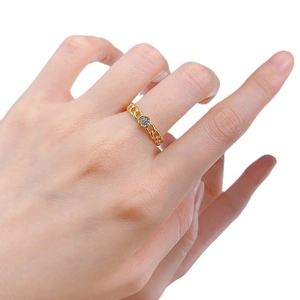 Modern gold Cuban chain ring for women featuring a sparkling round cubic zirconia