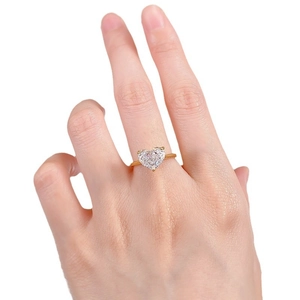 Elegant 10x8mm heart-cut carbon diamond S925 silver ring on hand with golden finish