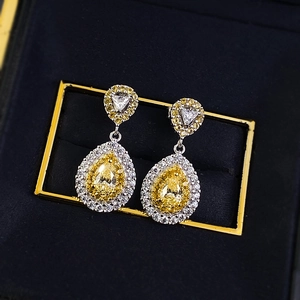 Elegant S925 silver pear-shaped drop earrings with yellow zircon and white halo crystals