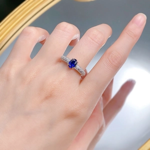 Luxurious 925 sterling silver ring with oval royal blue stone and baguette diamonds