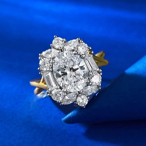 Luxurious 925 silver oval halo ring with yellow gold twisted band on blue background