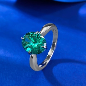 Minimalist S925 sterling silver ring with oval green emerald and four-prong setting