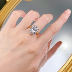 Luxury 925 silver oval cut cluster ring with sparkling crystals on female hand