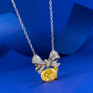 Collier en argent S925 avec pendentif nœud et diamant jaune ovale 7x9mm sur ruban bleu