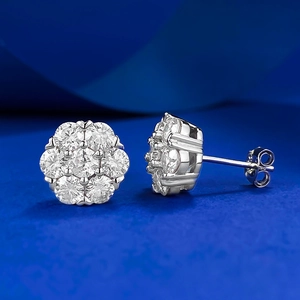 Macro view showing the 925 silver flower stud earrings set with brilliant moissanite stones