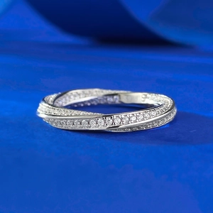 Detail of S925 sterling silver stamp on the twisted pave set diamond ring band