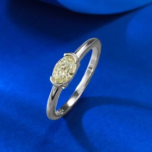 Elegant S925 sterling silver ring featuring a 4x6mm oval yellow gemstone at a 45-degree angle