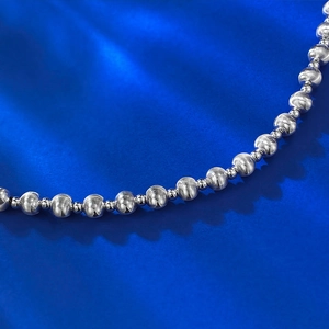 Close-up of S925 sterling silver beads with laser brushed texture and cat eye finish