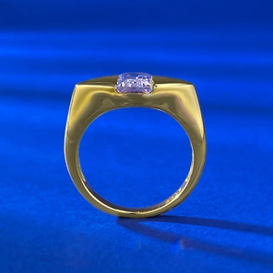 Macro shot of 5x7 purple stone ring with S925 silver hallmark on thick gold-plated band
