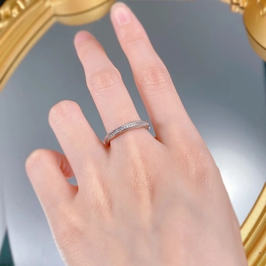 Close-up of minimalist S925 silver rhombic rope ring with pavé sparkling cubic zirconia