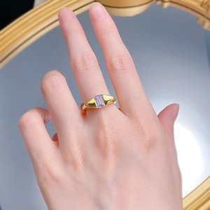 Close-up of S925 silver gold-plated ring with emerald-cut purple zircon stone detail