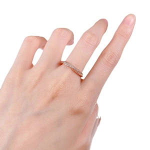 Elegant rose gold S925 silver twisted ring with shimmering pavé set cubic zirconia