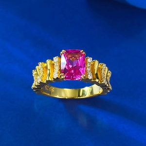 Detail view of the S925 hallmark on a gold-plated ring with pink tourmaline