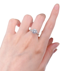 Elegant 925 sterling silver halo ring with a round brilliant cut lab diamond on hand