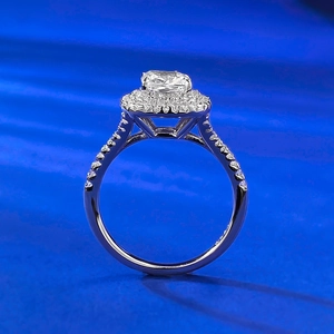 Luxury S925 silver ring with cushion-cut double halo diamonds on blue velvet