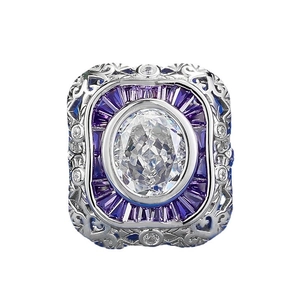 Art Deco S925 silver ring with oval clear center stone and purple trapezoid gems