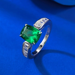 S925 sterling silver ring with rectangular emerald green gemstone and baguette side stones