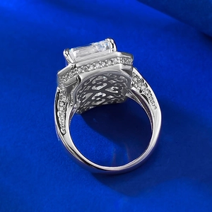 S925 sterling silver ring featuring a large emerald cut cubic zirconia with pave accents
