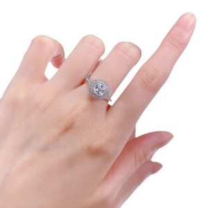 Luxury S925 silver cushion-cut ring with double halo pavé diamonds on model's finger