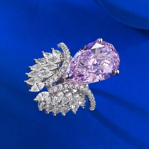 Luxurious S925 silver ring featuring a large pear-cut pink diamond and marquise side stones
