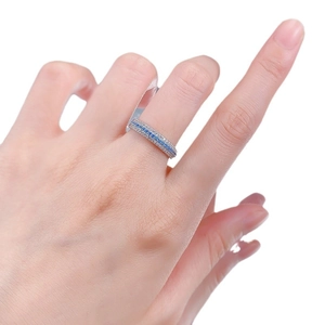Elegant S925 silver eternity band with three rows of blue and white pavé cubic zirconia