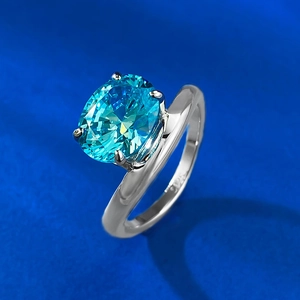 S925 silver ring with large oval light blue carbon diamond in a classic four-claw setting