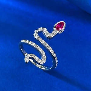 Detailed close-up of S925 sterling silver snake ring with red pear-cut gemstone