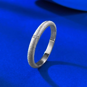 Macro shot of S925 sterling silver ring showing the brushed texture and hallmark