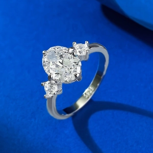 S925 sterling silver ring with 7x9mm oval carbon diamond in classic three-stone design