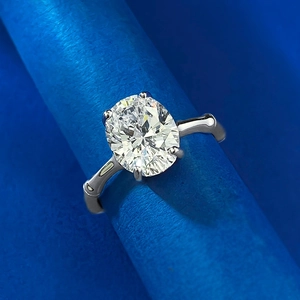 S925 silver ring featuring an oval white gemstone and unique bamboo joint band design
