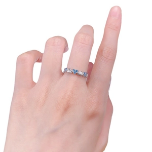 Vintage brushed silver heart ring with blue zircon stones in a full eternity band design