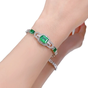 Elegant S925 silver bracelet featuring emerald-cut green gemstones and white zircon accents