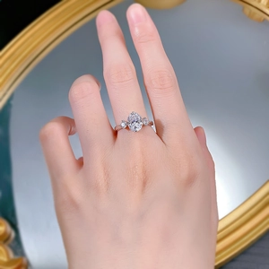 Close-up of S925 silver ring with large oval carbon diamond worn on a hand