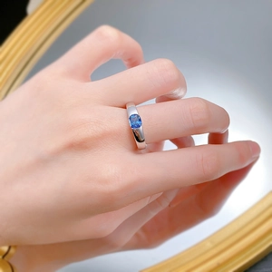 Detailed macro shot of a S925 silver ring featuring a rectangular royal blue sapphire stone