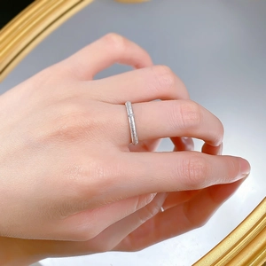 Close-up of minimalist S925 sterling silver brushed ring on finger for daily wear