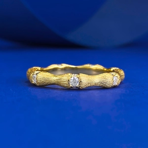 Handcrafted gold-plated S925 silver bamboo-style ring with three sparkling zircons