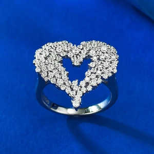 Macro shot of S925 sterling silver ring featuring a hollow heart set with cubic zirconia