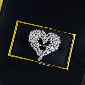 Sparkling S925 silver heart ring with pavé cubic zirconia in a black jewelry box