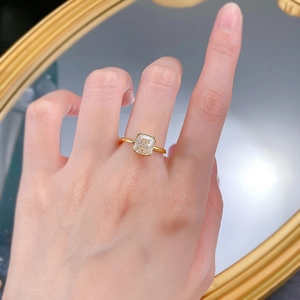 Elegance 925 silver ring featuring radiant cut white diamond in bezel setting on hand